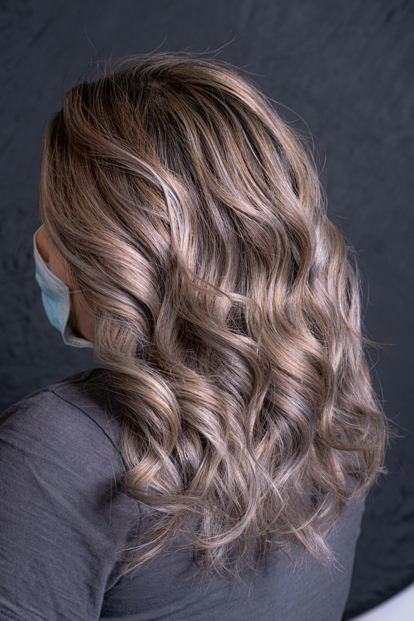 Woman with blended gray highlights